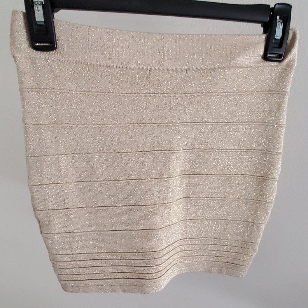 Womans size S gold with sparkles mini skirt
